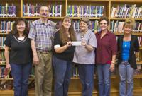 library_donation_to_Schulenburg_library_from_St_Annes_Society_2012.jpg